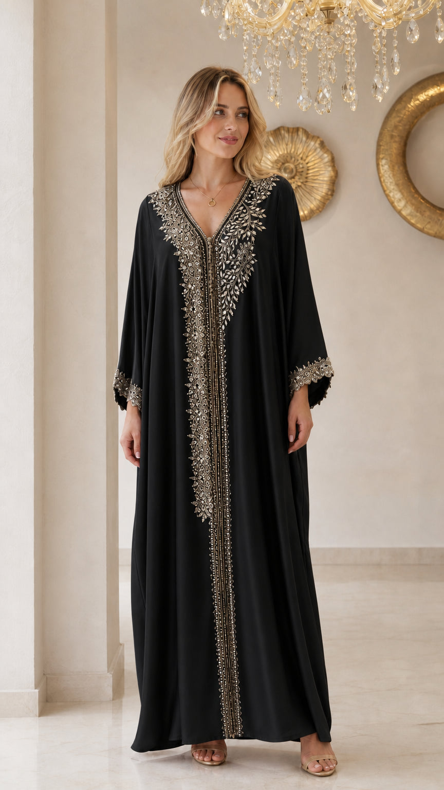 Front view of model wearing black embellished kaftan maxi dress