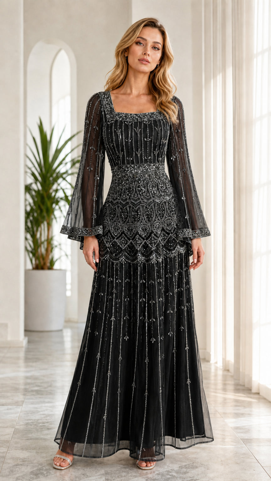 Model wearing black embellished square neck maxi evening gown with flared sleeves