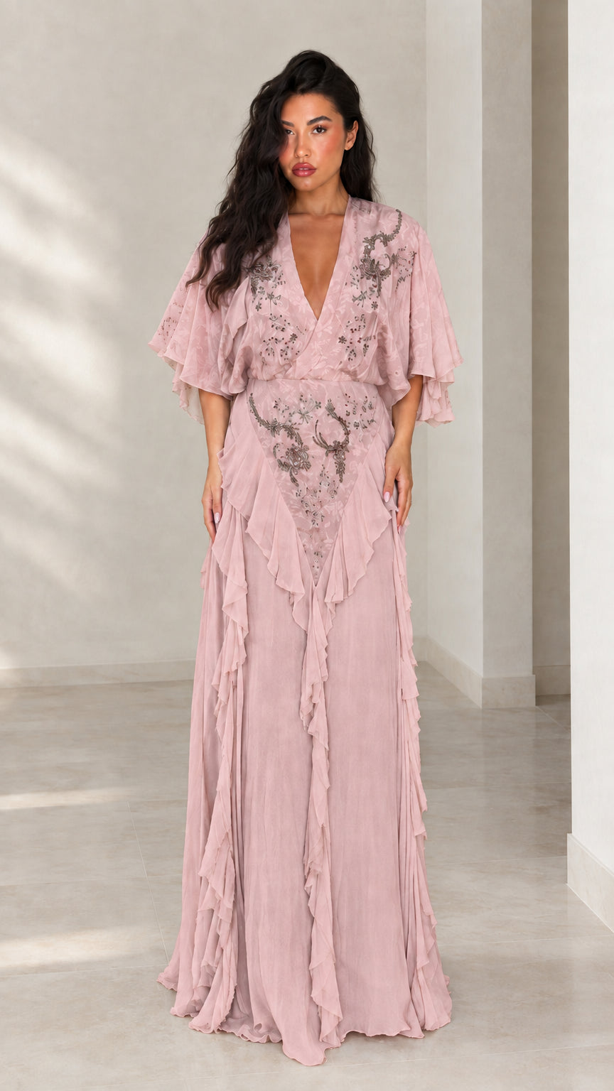 Front view of dusty pink beaded flutter sleeve ruffle formal maxi dress