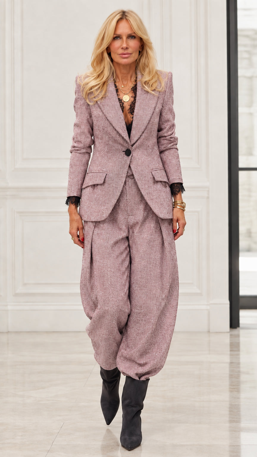 Model wearing Dusty Pink herringbone blazer and matching tapered balloon trousers