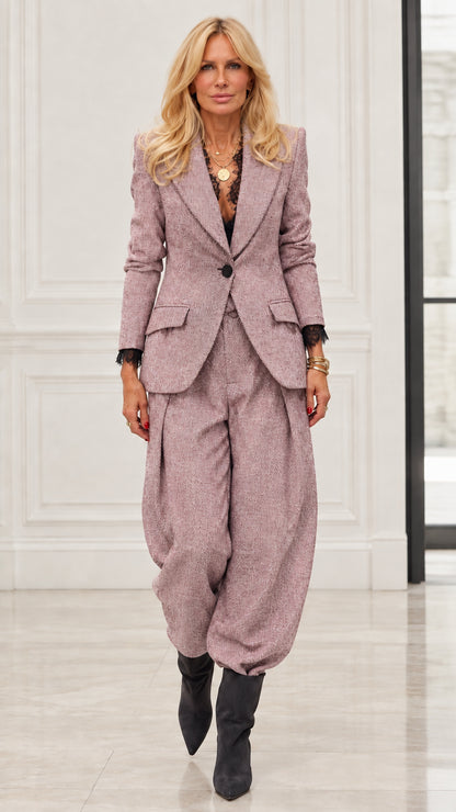 Model wearing Dusty Pink herringbone blazer and matching tapered balloon trousers