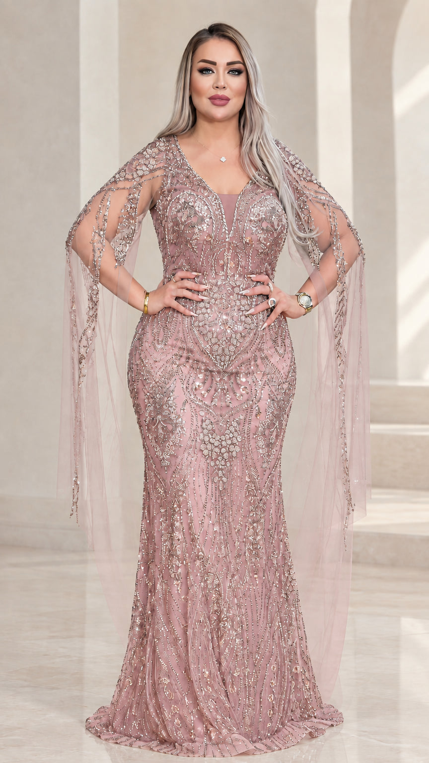 Front view of dusty rose pink sequined evening gown with cape sleeves