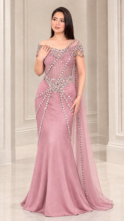 Full-length view of Dusty Rose beaded mermaid evening dress with shoulder cape