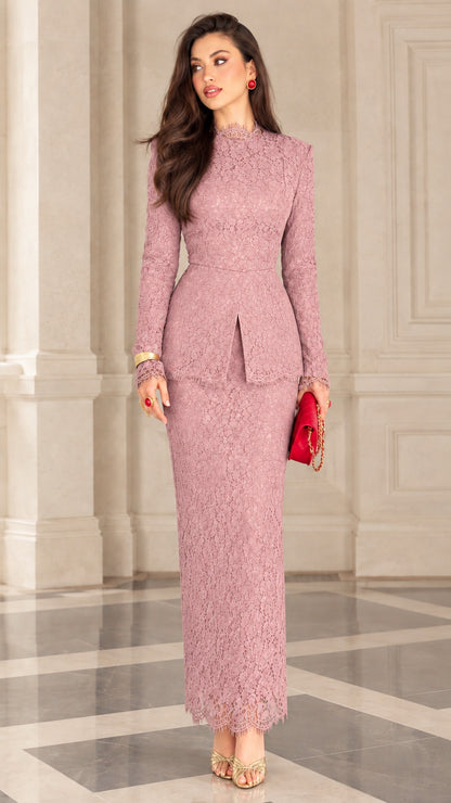 Model wearing dusty pink long sleeve floral lace peplum maxi skirt set