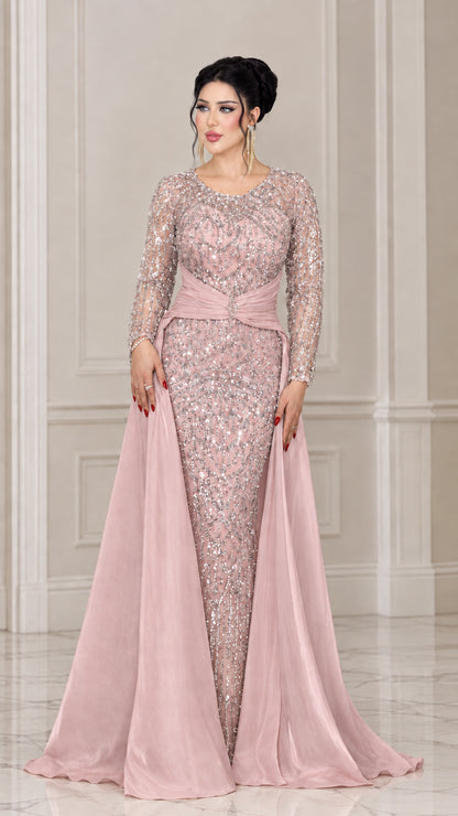Front view of the dusty pink sequin formal dress with draped satin overskirt