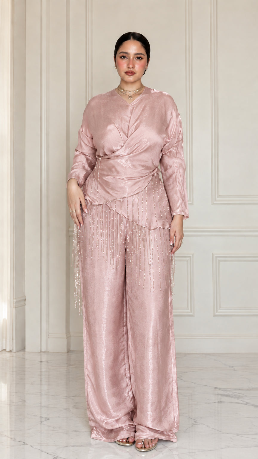 Full-length view of model wearing Dusty Rose satin draped two-piece set with beaded trim