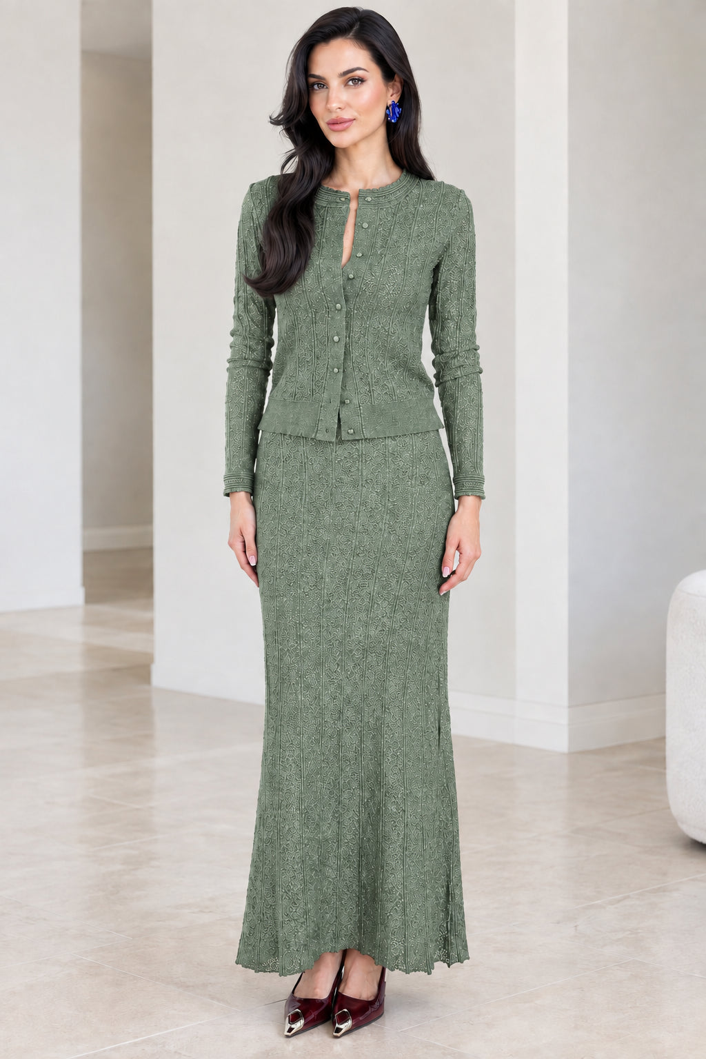 Front full-length view of sage green textured knit cardigan and maxi skirt set