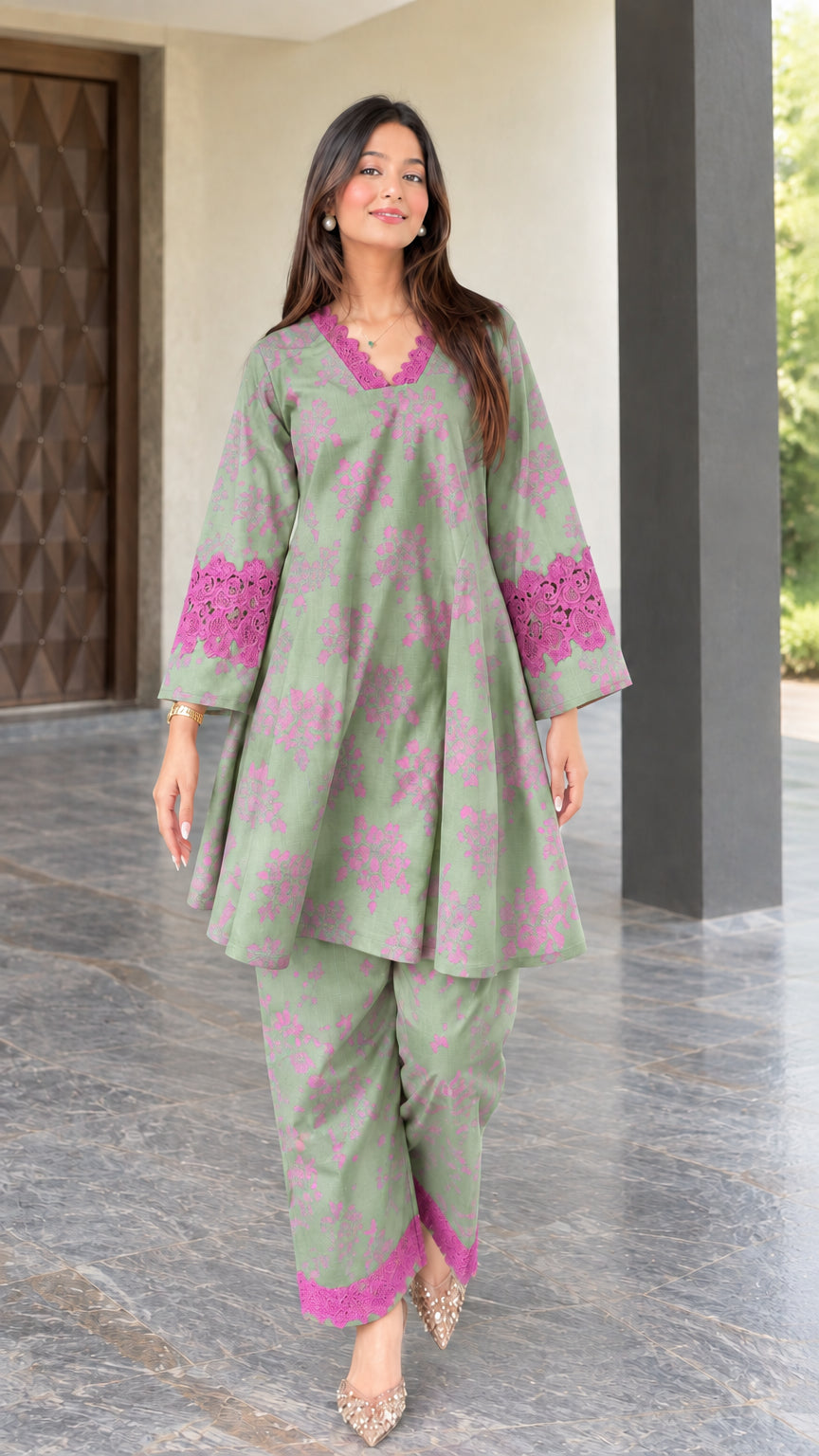 Front view of sage green floral print two-piece tunic and pant set