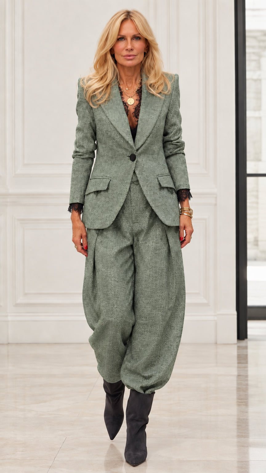Model wearing Sage Green herringbone two-piece pant suit set with lace trim