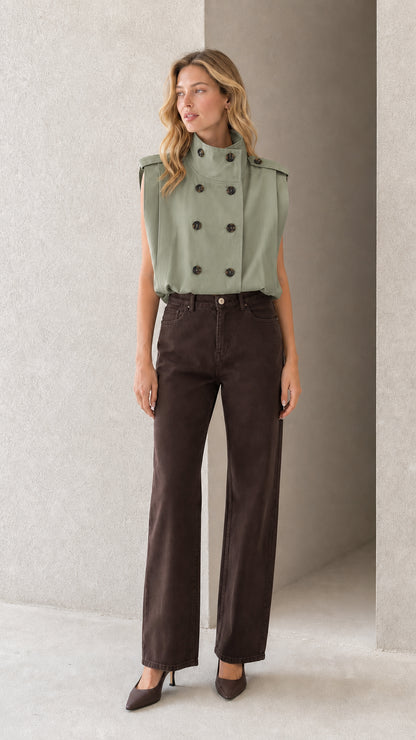 Model wearing sage green sleeveless double-breasted high collar blouse