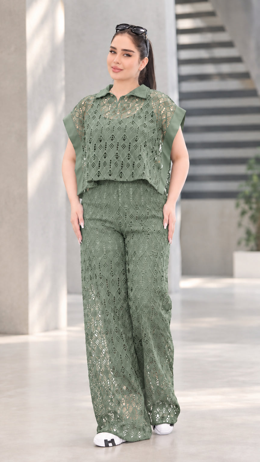 Front view of woman wearing sage green lace two-piece top and wide-leg pants set