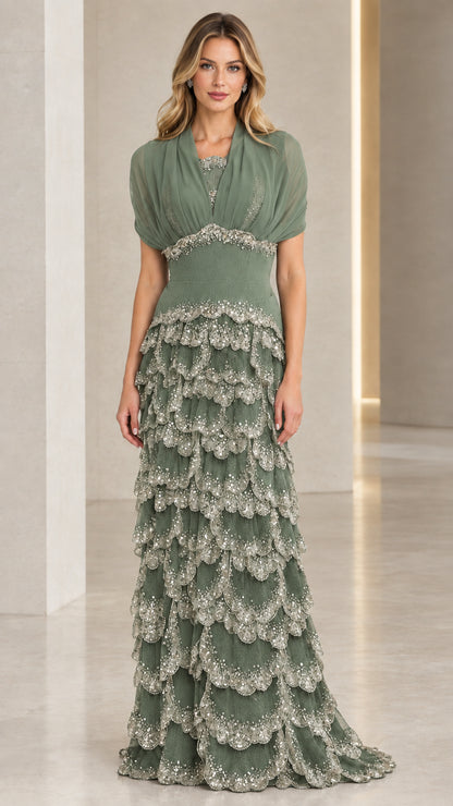 Sage green tiered sequin formal gown with draped short sleeves