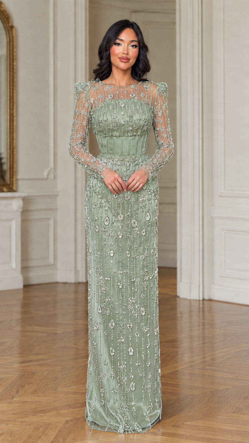 Model wearing sage green beaded long sleeve formal column gown