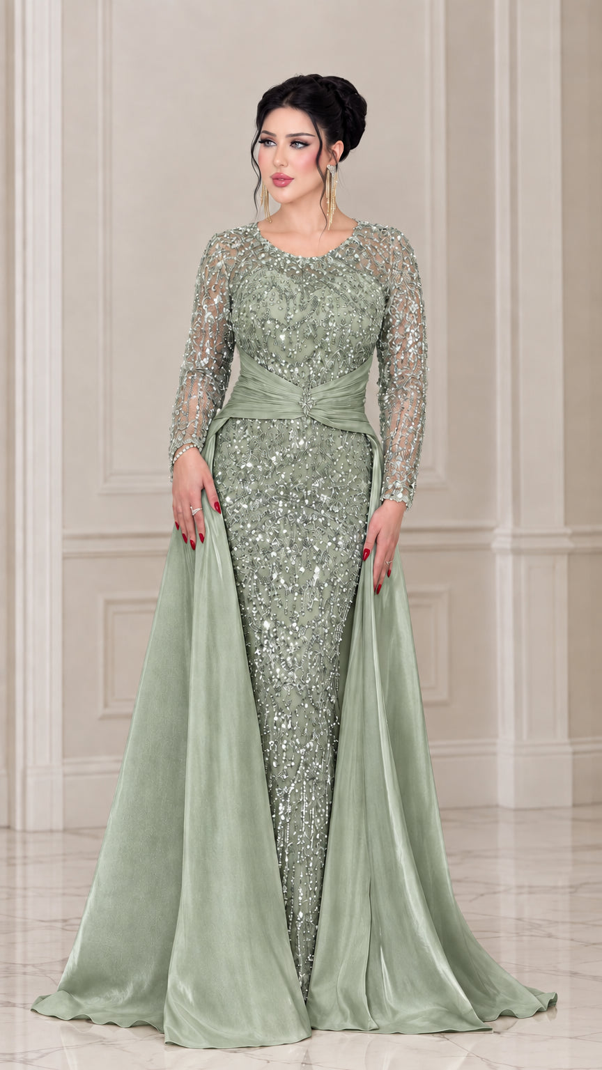 Front view of the sage green embellished evening gown with satin side train