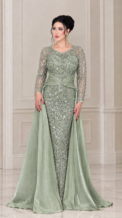 Front view of the sage green embellished evening gown with satin side train