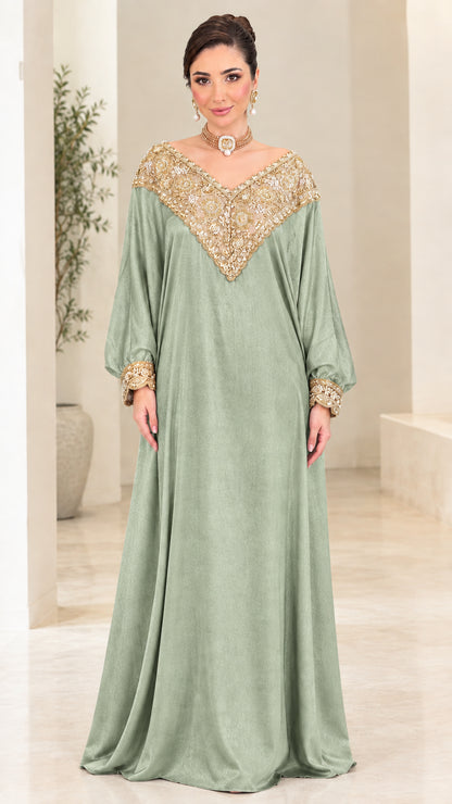 Front view of sage green kaftan maxi dress with ornate gold embroidery