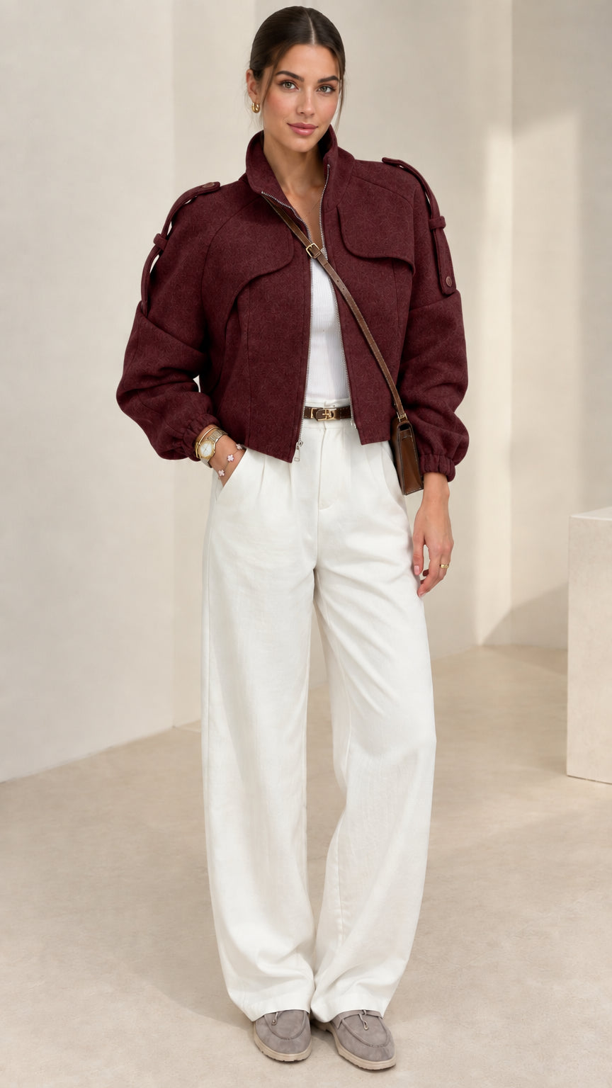 Burgundy wine red cropped utility jacket styled with white wide-leg trousers