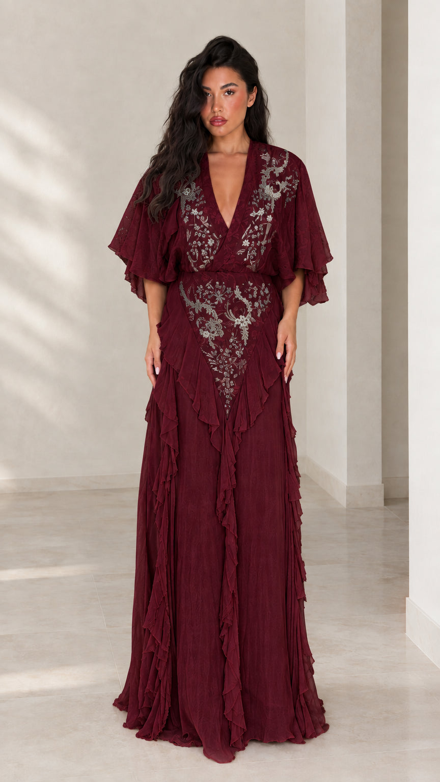 Front view of burgundy wine red embroidered flutter sleeve evening gown