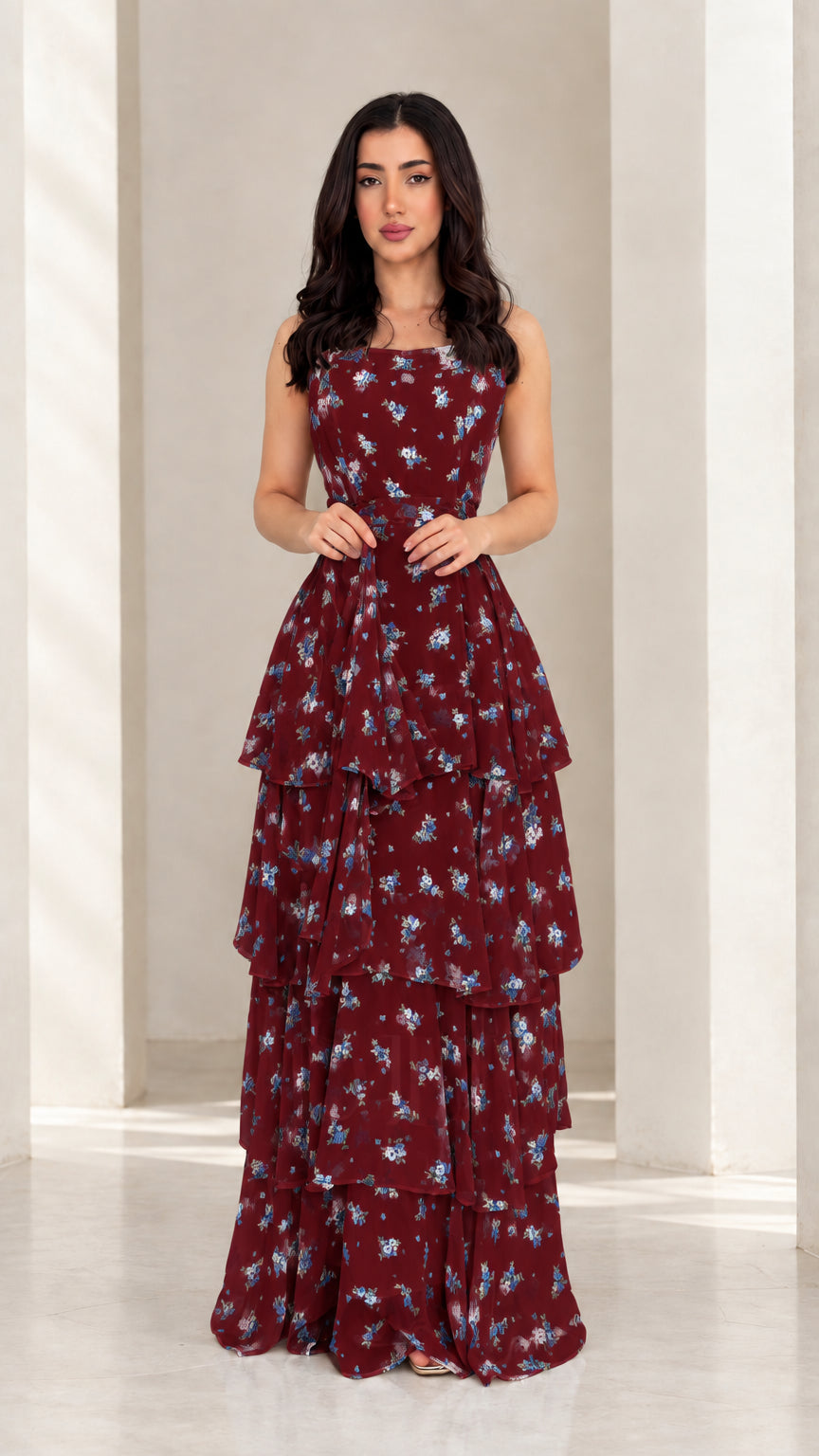 Model wearing burgundy floral tiered ruffle maxi dress