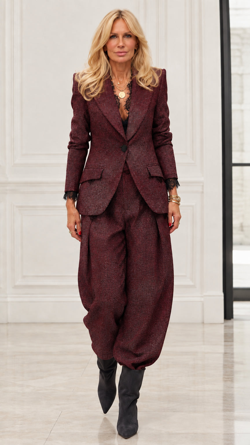 Model wearing Burgundy wine herringbone tailored blazer and matching pant suit