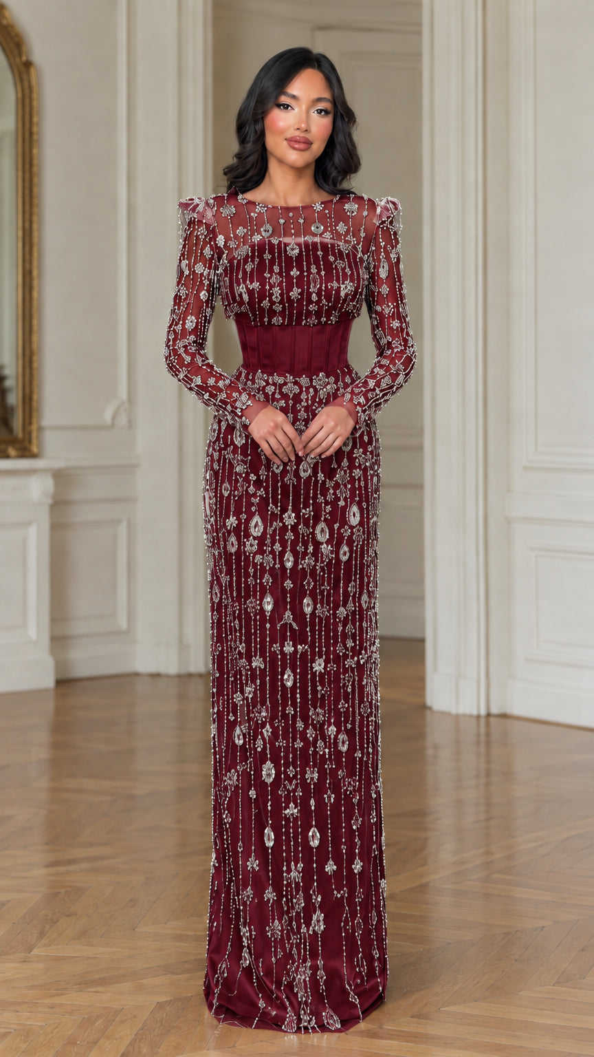 Model wearing burgundy beaded corset long sleeve evening maxi gown