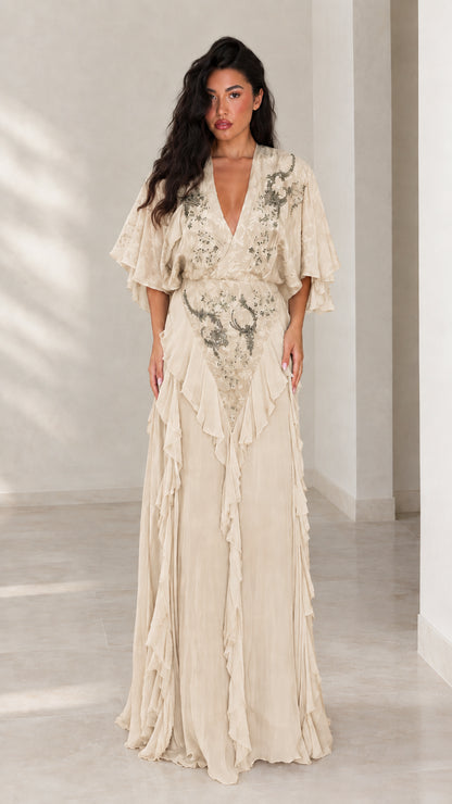 Front view of champagne beige embroidered V-neck formal maxi dress