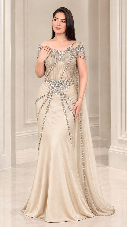 Full-length view of Champagne gold embellished mermaid evening gown