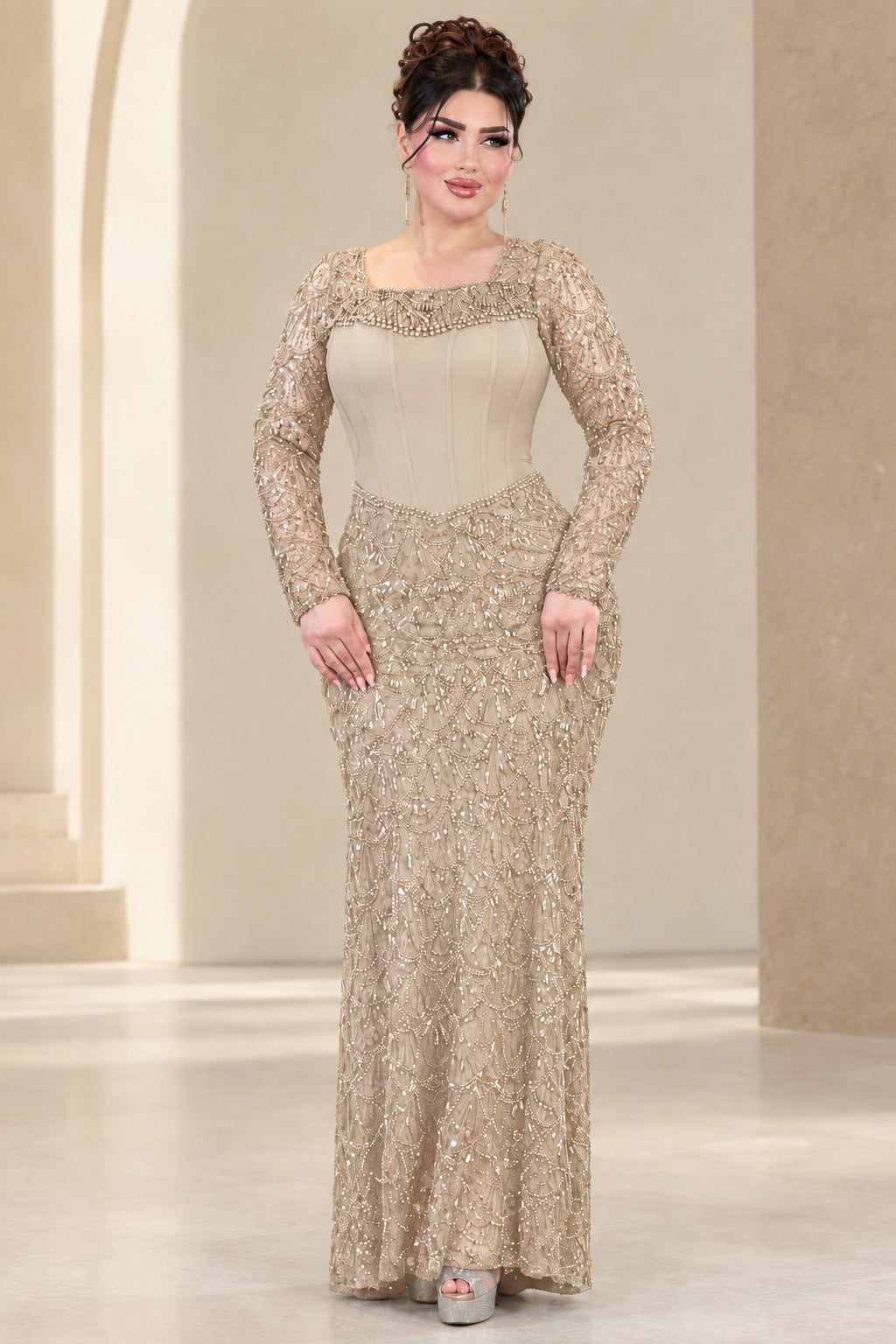 Champagne gold embellished long sleeve corset formal gown front view