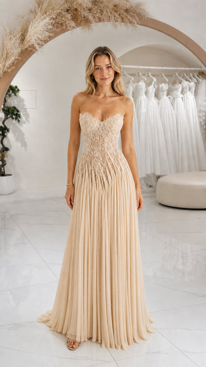 Front view of champagne strapless lace sweetheart pleated maxi gown