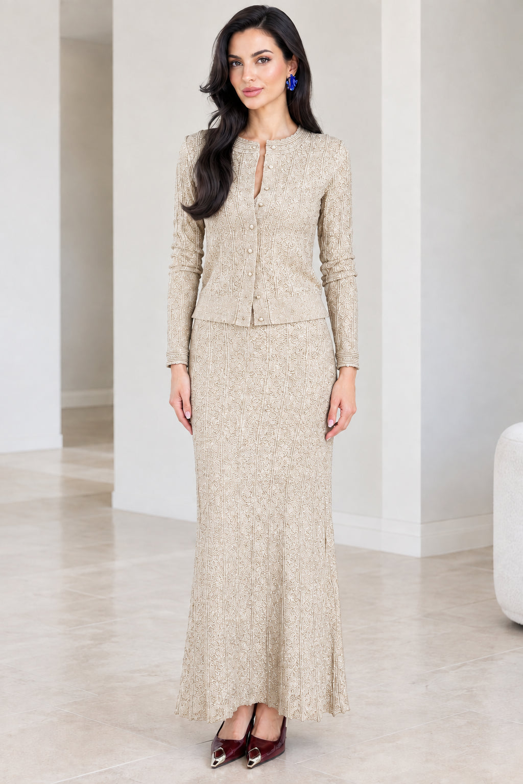 Front full-length view of champagne beige textured knit cardigan and maxi skirt set