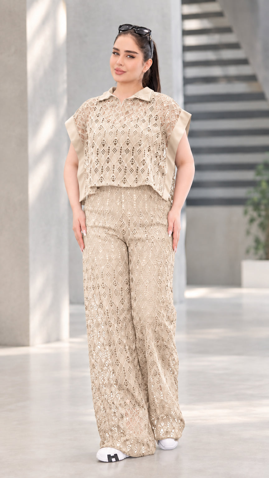 Front view of woman wearing beige khaki lace two-piece top and wide-leg pants set