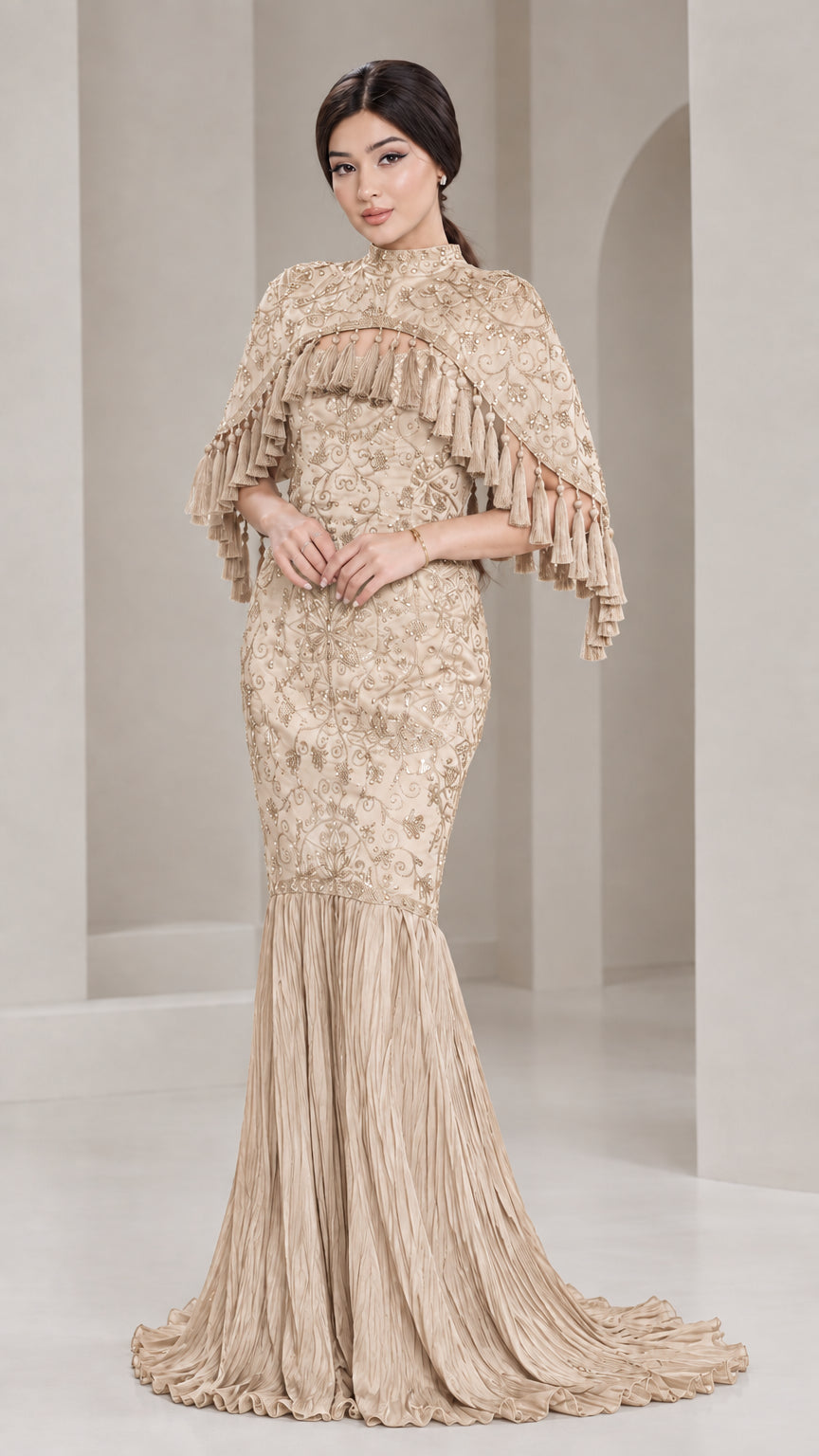 Front view of model wearing Champagne gold sequin cape mermaid evening gown