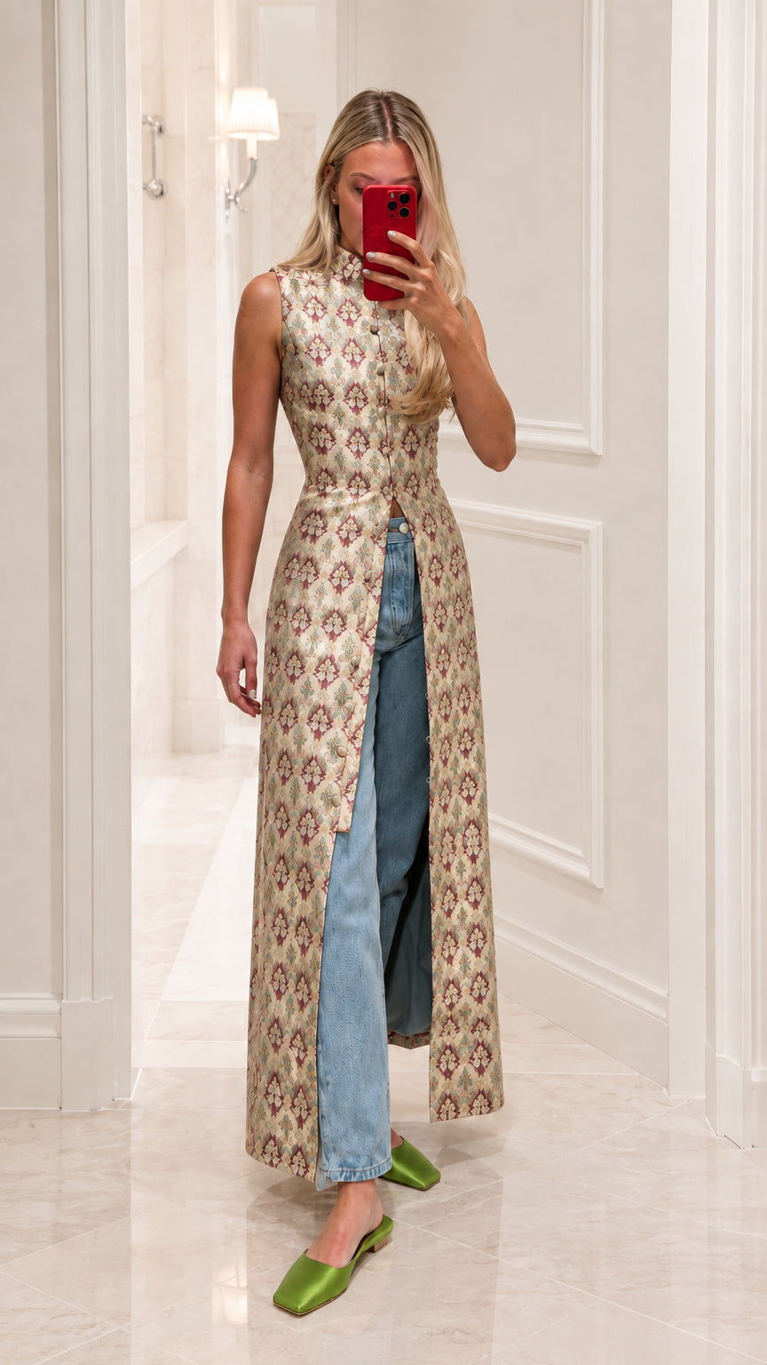 Model wearing champagne gold metallic jacquard maxi tunic vest