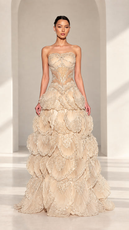 Front view of strapless beaded corset petal evening gown in Champagne